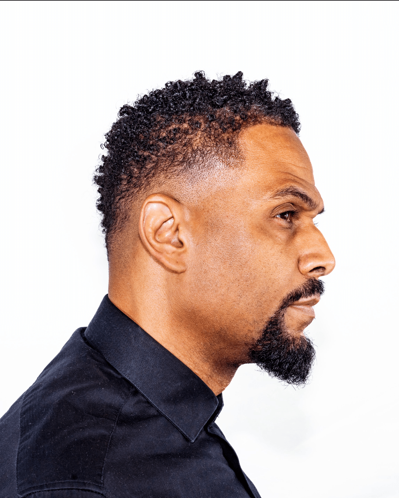 Kenny Jones - Owner & Master Cosmetologist